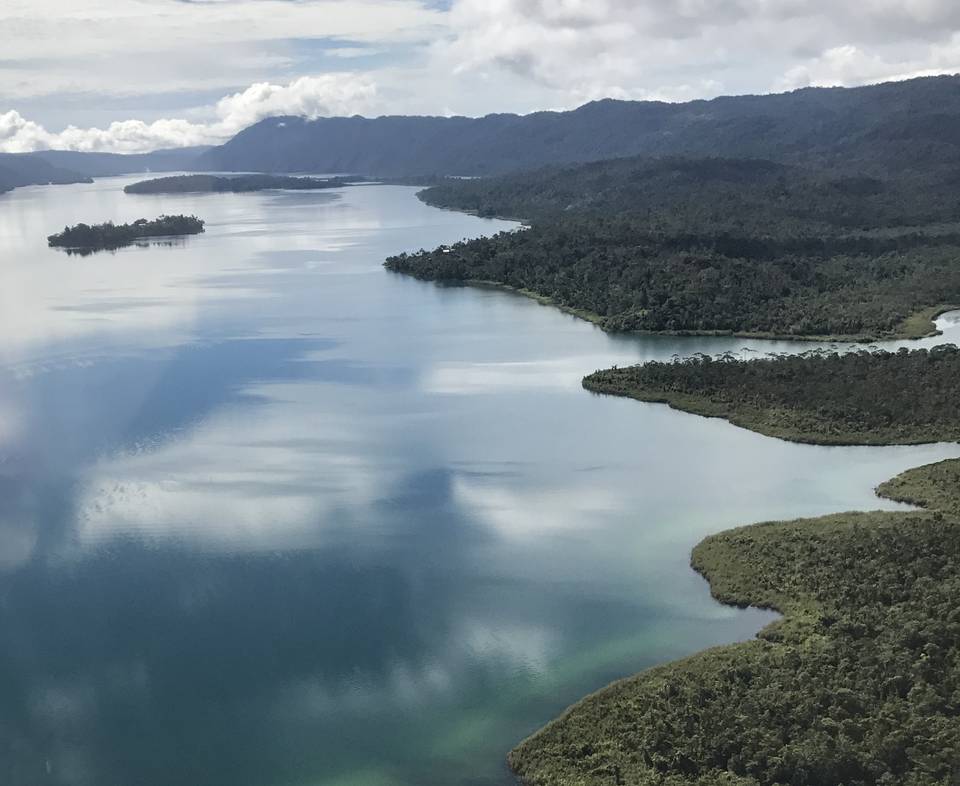 Aerial view of rainforest and a river in Papua New Guinea